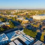 Aerial view on Center Street at Pepper Place at sunset, in Mesa, Arizona.
