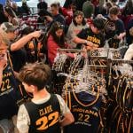 Fans looking at the merchandise in the team store before the game between the New York Liberty and the Indiana Fever at Gainbridge Fieldhouse, Indiana.