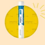 A Wegovy pen against a sunny concept background.