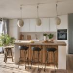 A stylish modern interior of a home kitchen.