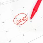 The word "court" encircled on a calendar's date.