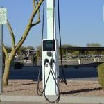 An Autel electric car charging station located at a business district.