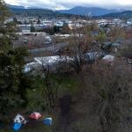 Unhoused people have set up a tent community at Riverside Park in Grants Pass, Oregon.
