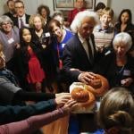 Congregation Eitz Chayim join together for the kiddush during their observance of Rosh Hashana in Cambridge, Massachusetts September 24, 2014. 