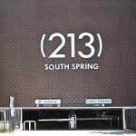 City area code "213" in South Spring on the LA Times parking garage facing Broadway in Los Angeles, California.
