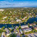 Aerial view of beachside residential homes in Naples, Florida.