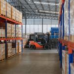 Interior of a modern auto parts factory or warehouse.