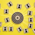 A wooden target board connecting many wooden cube with a figure icon.