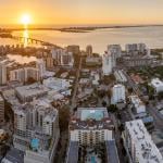 Aerial view of a downtown real estate development in Sarasota City in Florida during sunset.