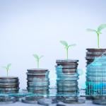 Row of coins illustrated with growing plants and finance charts.