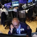 Traders work on the floor of the New York Stock Exchange during morning trading on September 17, 2025 in New York City when stocks were on the rise during the market open in anticipation of an interest rate cut.