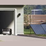 A modern home with a solar power home battery system.