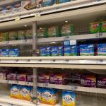 Xyzal and Zyrtec inside a pharmacy shelf with other allergy and sinus products.