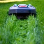 A robot mower cutting high grass.