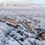 Aerial view of Detroit's Palmer Park neighborhood covered in snow.