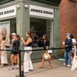 Customers waiting to go in at the grand opening of the Jones Road brand cosmetics store in Greenwich Village in New York.