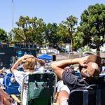 Audience put their hands on their heads in shock at the 2023 Little League World Series in El Segundo, California.