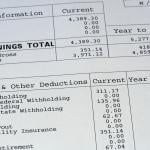 A close up view on a pay stub.