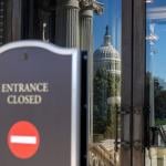 An 'entrance closed' sign at the Library of Congress in Washington, DC, is closed on October 21, 2025 due to the US government shutdown. 