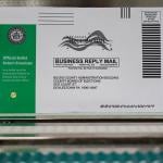 A Pennsylvania mail-in ballot with a green stripe on the envelope is displayed during a processing demonstration at the Board of Elections office on September 30, 2024 in Doylestown, Pennsylvania. 