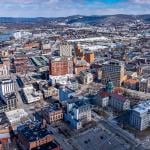 Winter afternoon aerial photo over downtown Binghamton, NY in March 2025.