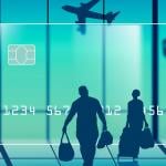 A 3D illustration of a credit card with air travelers in an airport terminal.