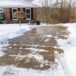 Long, steep, driveway in Kentucky after snow storm, all cleaned up with shoveling and salting. 