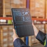 A smart warehouse management system app on a tablet.