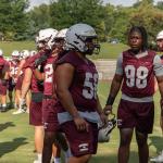 Roanoke College's football players during a practice drill.
