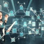 A businesswoman interacting with a 3D holographic network of people concept technology.