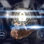 A businessperson touching a lock icon as part of a cybersecurity technology software graphic.