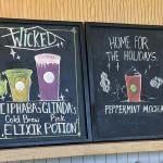 A chalkboard menu featuring Wicked x Starbucks' collaboration drinks.