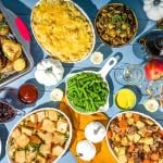 Traditional Thanksgiving food laid on a table.