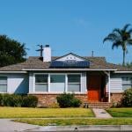 A modern cottage with solar roof panels.