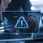 Cybersecurity software graphics displayed in front of a user.