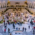 Christmas decorations fill the interior of a shopping mall in Manhattan, New York.