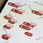 Homes listed for sale in Seattle, Washington, are seen on the map in the Zillow app on a smartphone.
