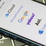 Logos of mail apps on a phone.