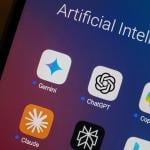 Google Gemini, ChatGPT, Microsoft Copilot, Claude by Anthropic, Perplexity and Bing apps displayed in an app folder on a smartphone.