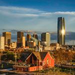 A view of Oklahoma City's skyline during sunset.