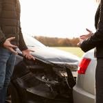 Two drivers arguing after a road accident.