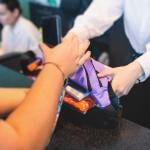 Employee receiving a corporate gifts package.