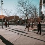 People along a walkway during wintertime.