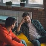Two young men having a conversation.