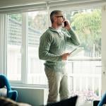 Man working from home engaged on a call.