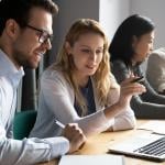 A diverse corporate team working together on a project.