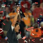 Tom Brady holding up a trophy after winning uper Bowl LV at Raymond James Stadium on February 07, 2021 in Tampa, Florida.