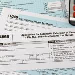US tax forms 1040 and 4868.