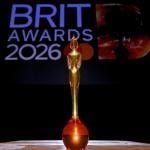 A close up on a BRIT award trophy against a background for the 'BRIT Awards 2026'.
