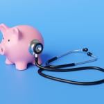 A piggy bank with a stethoscope.